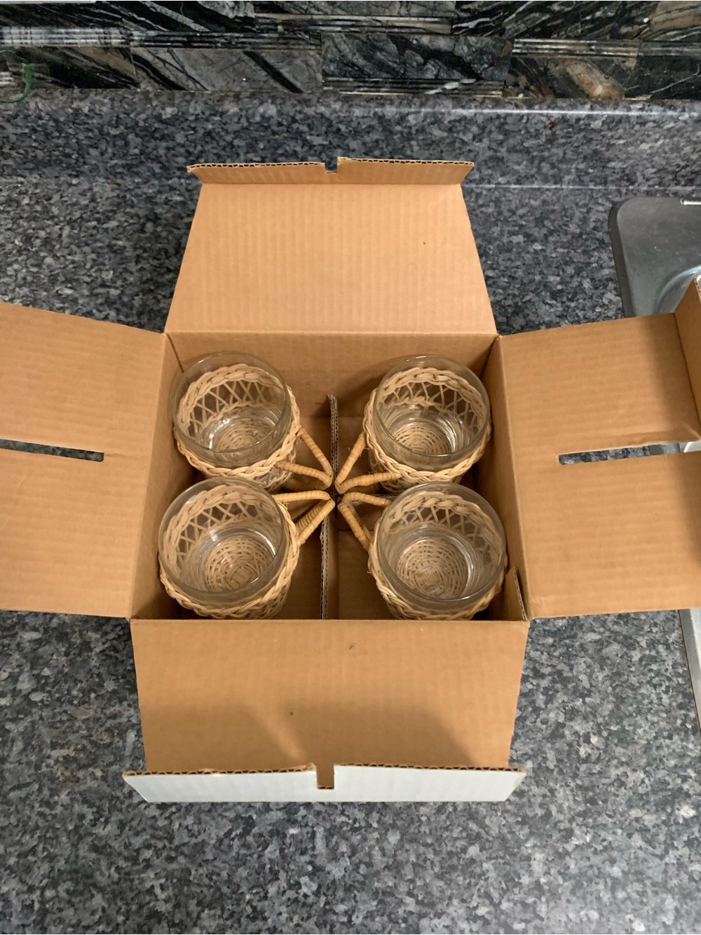 Vintage wicker glass set.